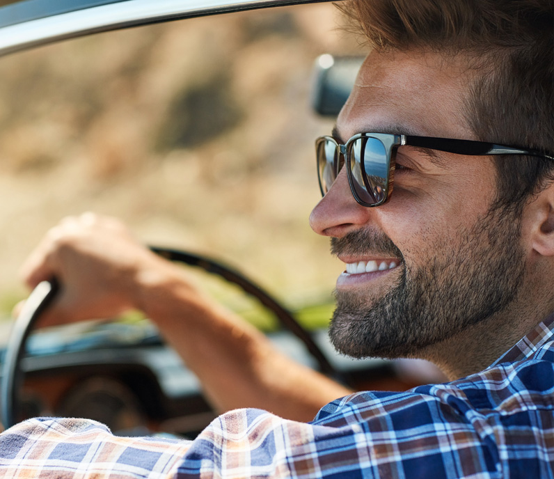 Fairfield Therapy smiling man driving car