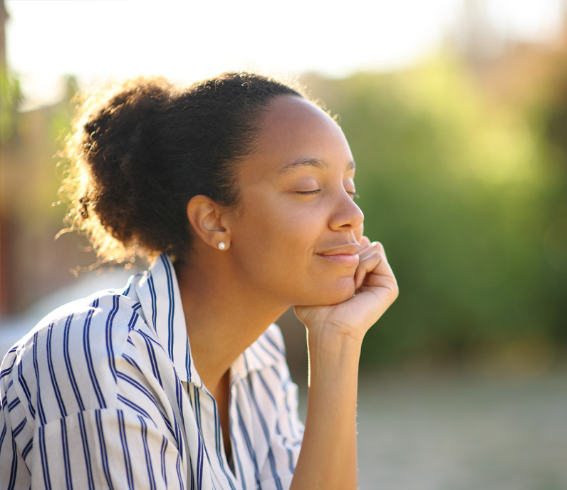 Hollister Therapy peaceful woman with hand on chin